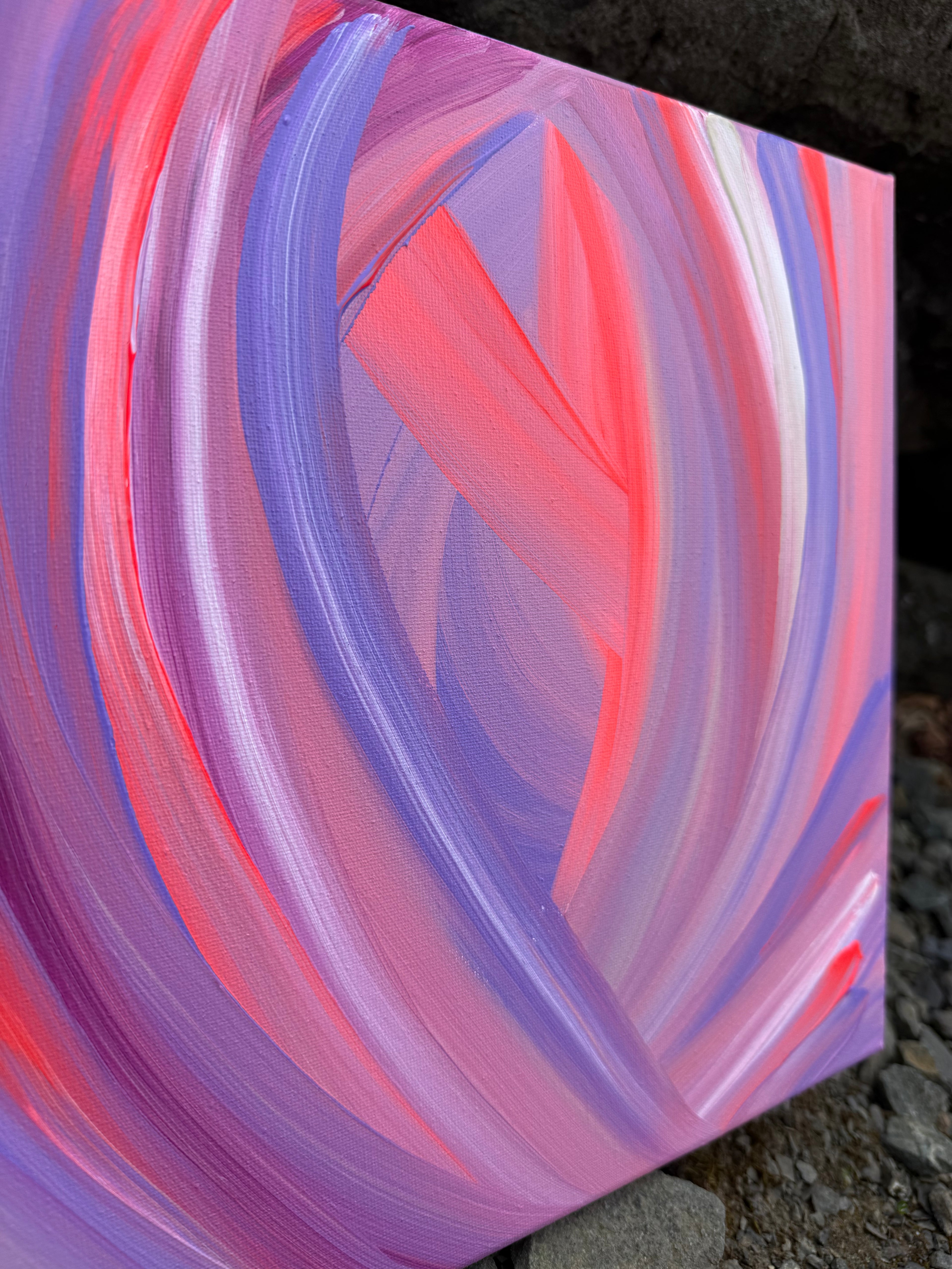 Abstract painting with swirling pink and purple colors on a textured surface.
